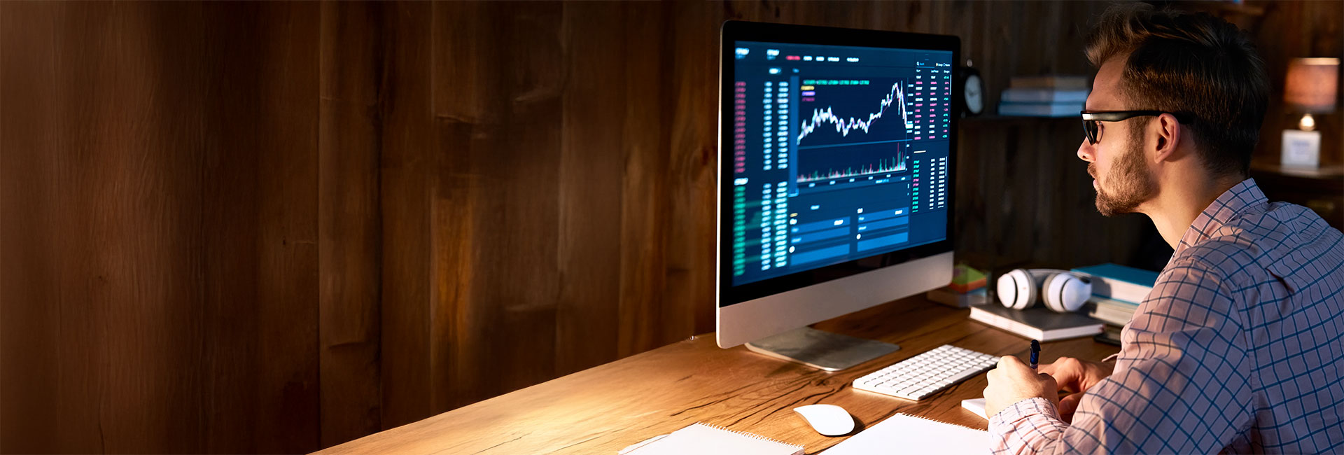 an arab woman writing on a book